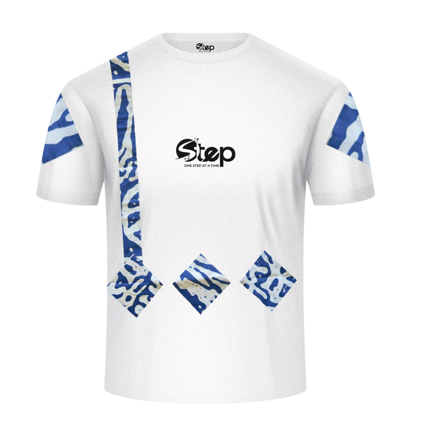 White tee with colorful Kente-inspired geometric patterns